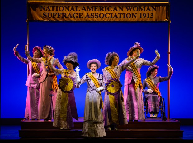 Jenn Colella as Carrie Chapman Catt and cast in "Suffs" on Broadway at the Music Box Theatre in New York. (Joan Marcus)