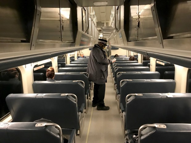 A Metra Electric train leaves Millennium Station with low ridership during the usual time of afternoon rush, March 16, 2020. (Todd Panagopoulos/Chicago Tribune)