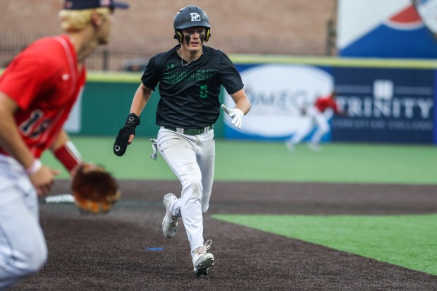 Providence's Nate O'Donnell (6) runs to third base during the Class 4A State Championship game against Conant in Joliet on Saturday, June 8, 2024. (Troy Stolt/for the Daily Southtown)