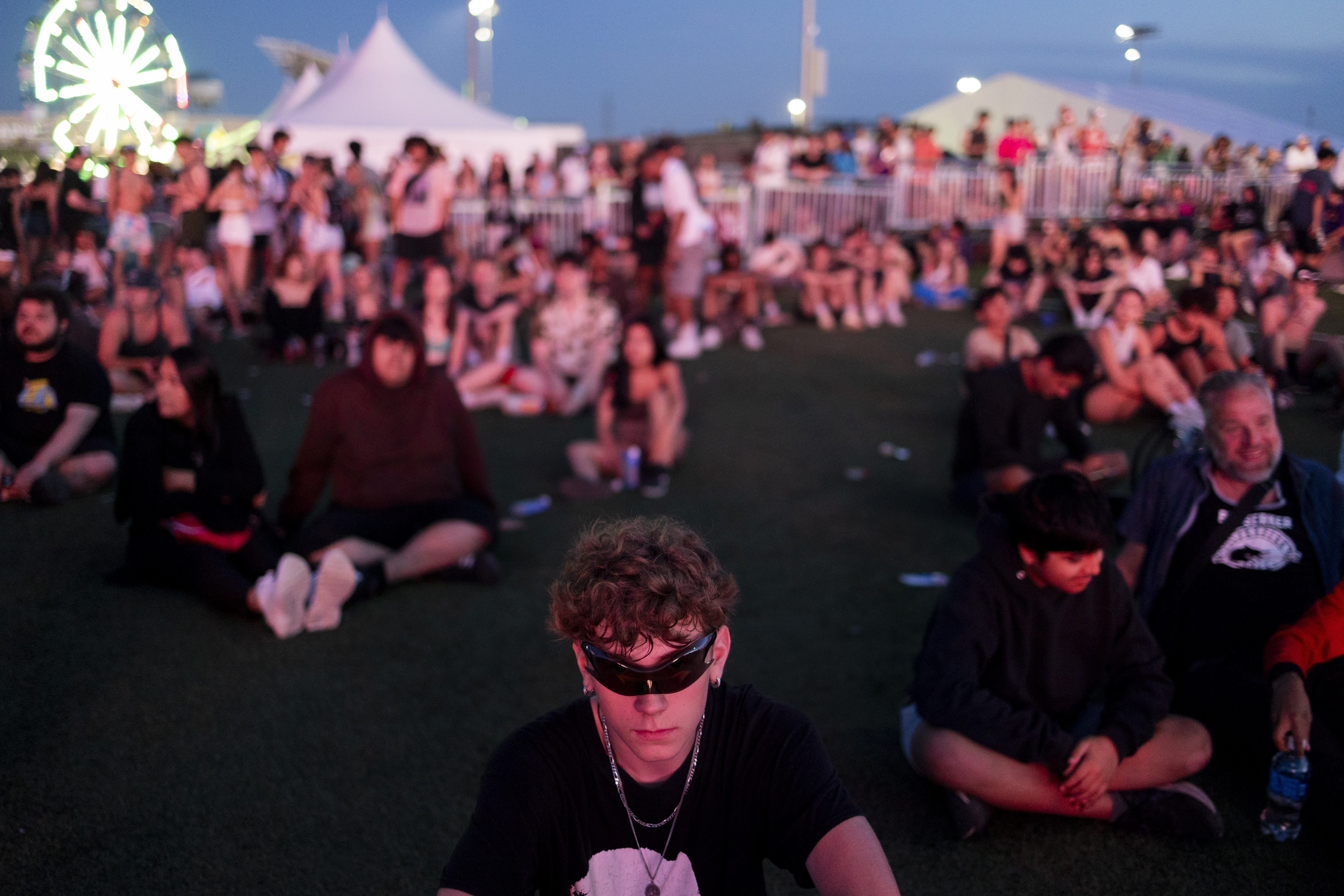 Ezekiel Meyers watches a performance by Destroy Lonely on Friday, June 14, 2024, at the Summer Smash Music Festival at SeatGeek Stadium in Bridgeview, Ill.(Vincent Alban/Chicago Tribune)