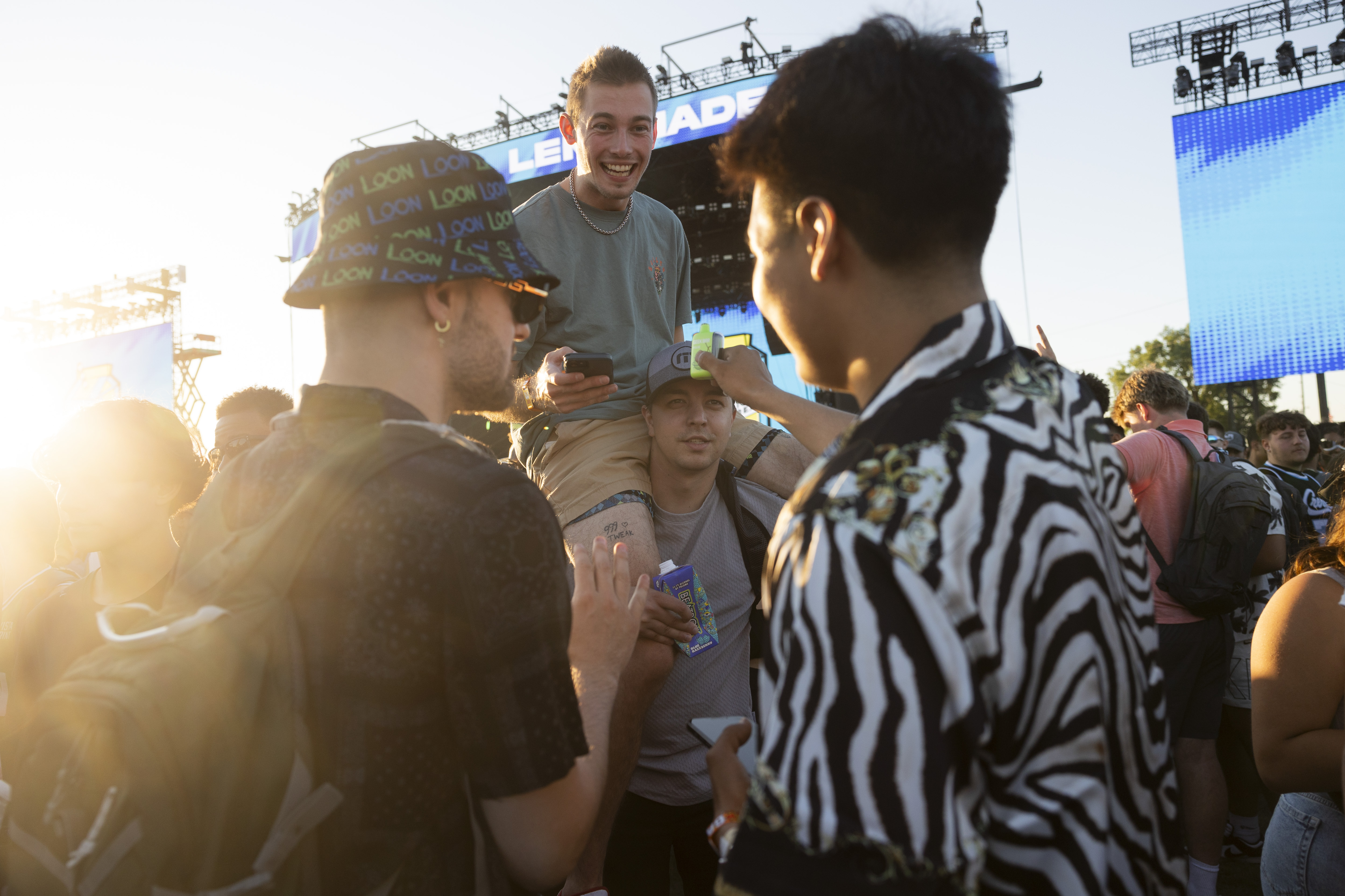 Jared Stanke sits on the shoulders of Griffin Kinny on...