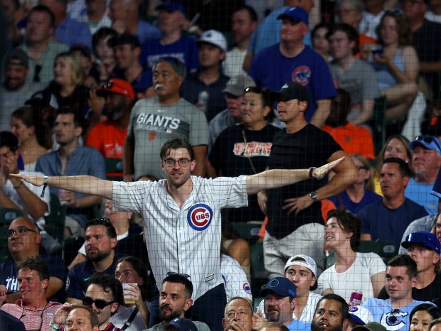 Fans react to Chicago Cubs first base Patrick Wisdom (16) being called out at the plate in the 5th inning at Wrigley Field on June 17, 2024, in Chicago. (Stacey Wescott/Chicago Tribune)