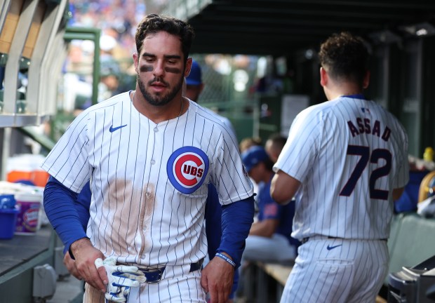 Chicago Cubs designated hitter Mike Tauchman (40) leaves the game with left groun tightness in the bottom of the third inning against the San Francisco Giants at Wrigley Field on June 16, 2024, in Chicago. (Stacey Wescott/Chicago Tribune)