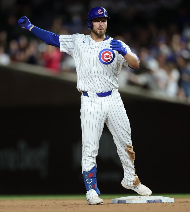 Chicago Cubs first baseman Michael Busch celebrates after his double in the 8th inning of a game against the San Francisco Giants at Wrigley Field in Chicago on June 18, 2024. (Chris Sweda/Chicago Tribune)