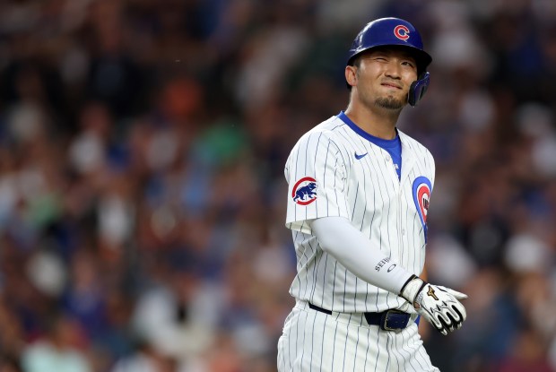 Chicago Cubs designated hitter Seiya Suzuki reacts as he walks back to the dugout after flying out deep with the bases loaded to end the fifth inning of a game against the San Francisco Giants at Wrigley Field in Chicago on June 18, 2024. (Chris Sweda/Chicago Tribune)