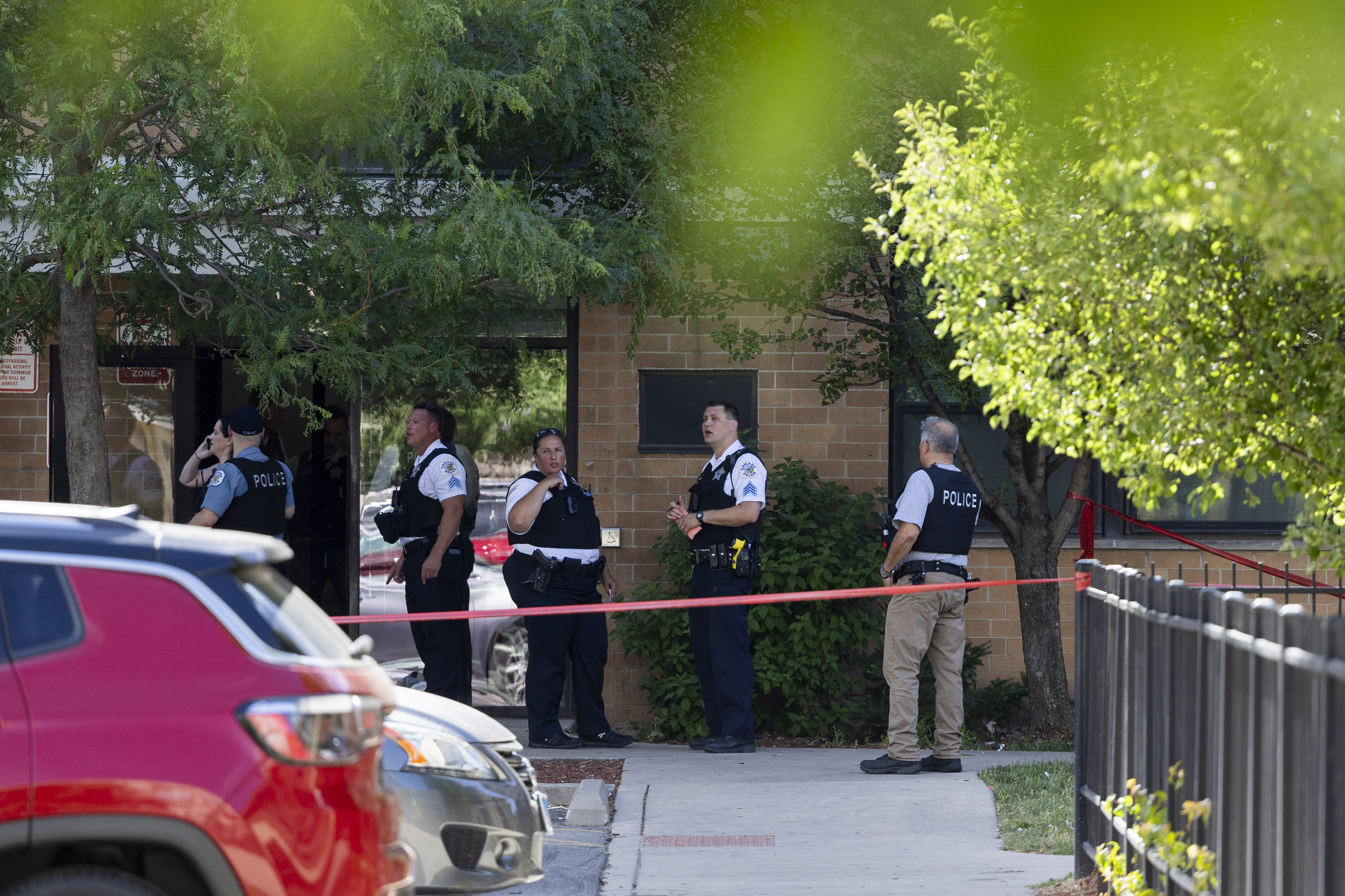 Chicago police work a crime scene on June 18, 2024,...