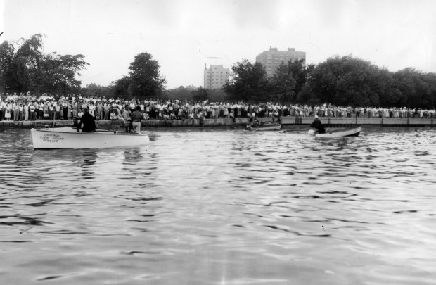 The Coast Guard continued to search for bodies of victims of a giant wave that washed dozens of fishermen off the Montrose Harbor pier on June 26, 1954. Eight people were killed. (Al Phillips/Chicago American)