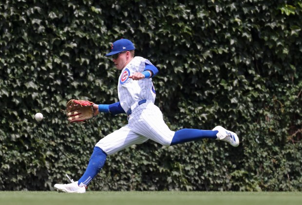 Cubs centerfielder Pete Crow-Armstrong chases after a ball hit Mets designated hitter J.D. Martinez for a single in the first inning at Wrigley Field on June 22, 2024, in Chicago. (John J. Kim/Chicago Tribune)