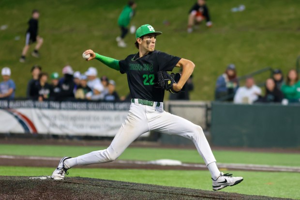 Providence's Kasten Goebbert (22) throws a pitch during the Class 4A State Championship game against Conant in Joliet on Saturday, June 8, 2024. (Troy Stolt/for the Daily Southtown)