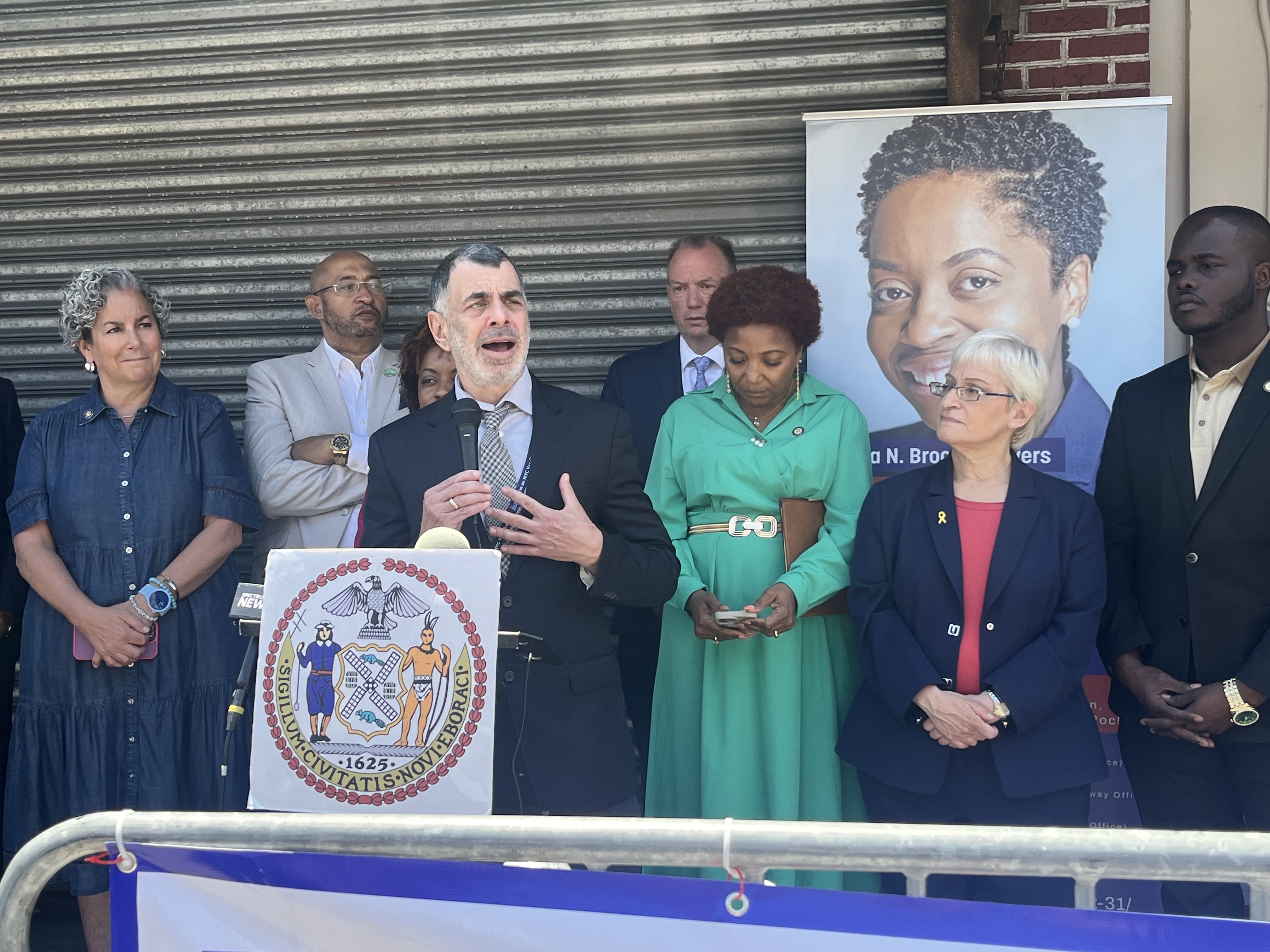 Dr. Mitchell Katz, president and CEO of NYC Health + Hospitals, speaks in favor of a new trauma hospital for Far Rockaway, in front of Councilmember Selvena Brooks-Powers' office there.