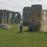 Climate protesters arrested after painting Stonehenge monument orange