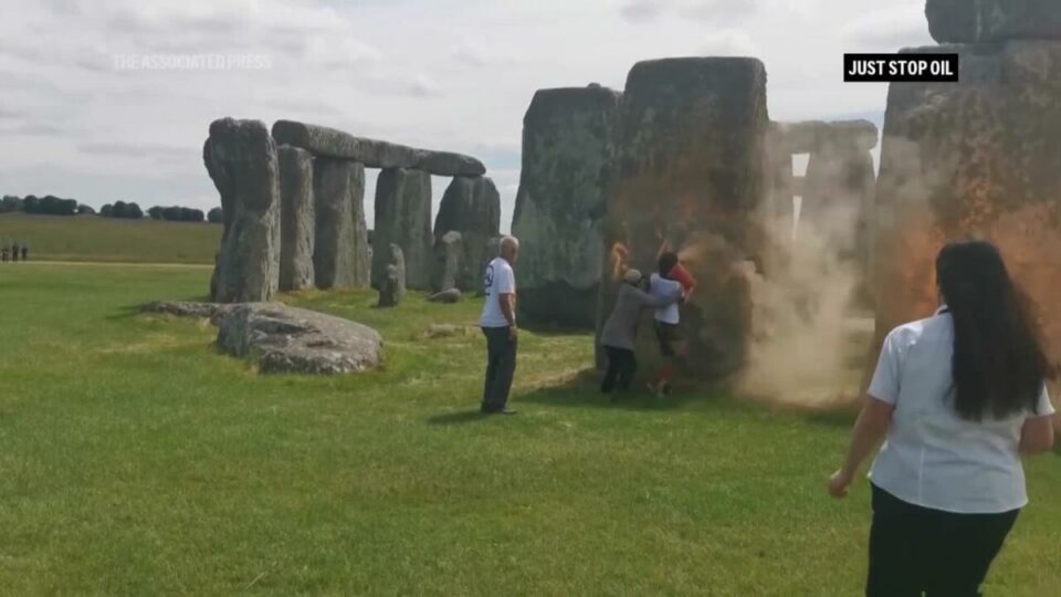 Climate protesters arrested after painting Stonehenge monument orange