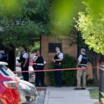 Chicago police work a crime scene on June 18, 2024, at the Oakley Square apartment complex in Chicago, where a 7-year-old boy was shot and killed. (Vincent Alban/Chicago Tribune)