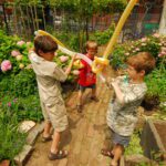 Kids play in a New York City garden.