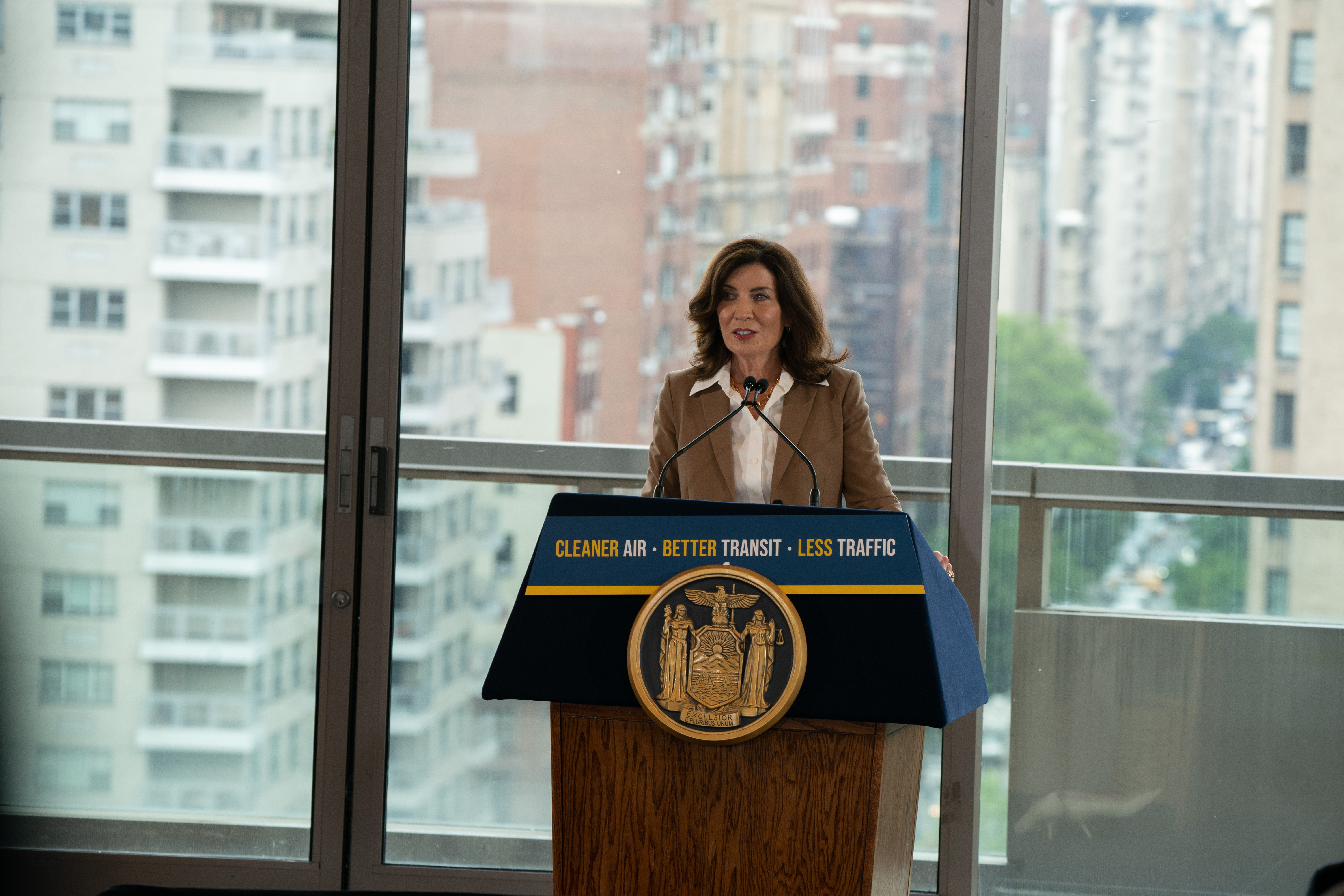 Gov. Hochul speaks at a podium.