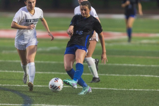 St. Charles North's Kaitlin Glenn (25) takes a shot at the net against New Trier in the Class 3A championship game, at North Central College in Naperville on Saturday, June 1, 2024. (Vincent D. Johnson/for the Beacon-News)