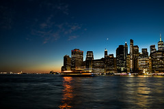 Manhattan financial district at sunset view from DUMBO