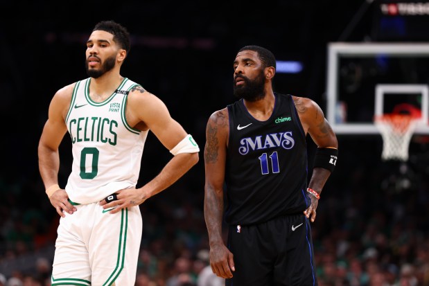 Kyrie Irving (right) finished with just 12 points in Game 1. 