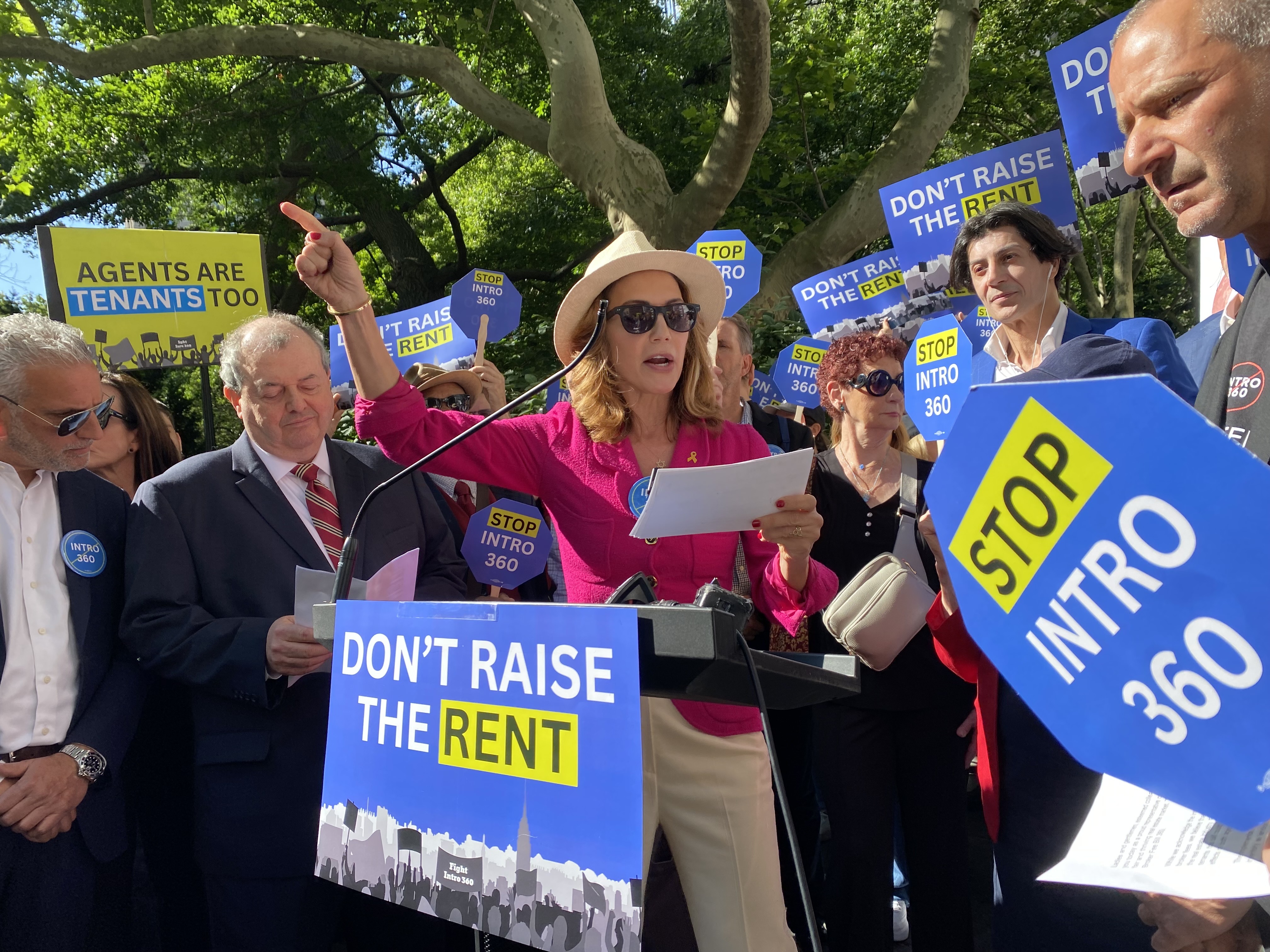 Bess Freedman, CEO of real estate company Brown Harris Stevens, speaks at a rally against NYC Council legislation to change how broker fees are paid.