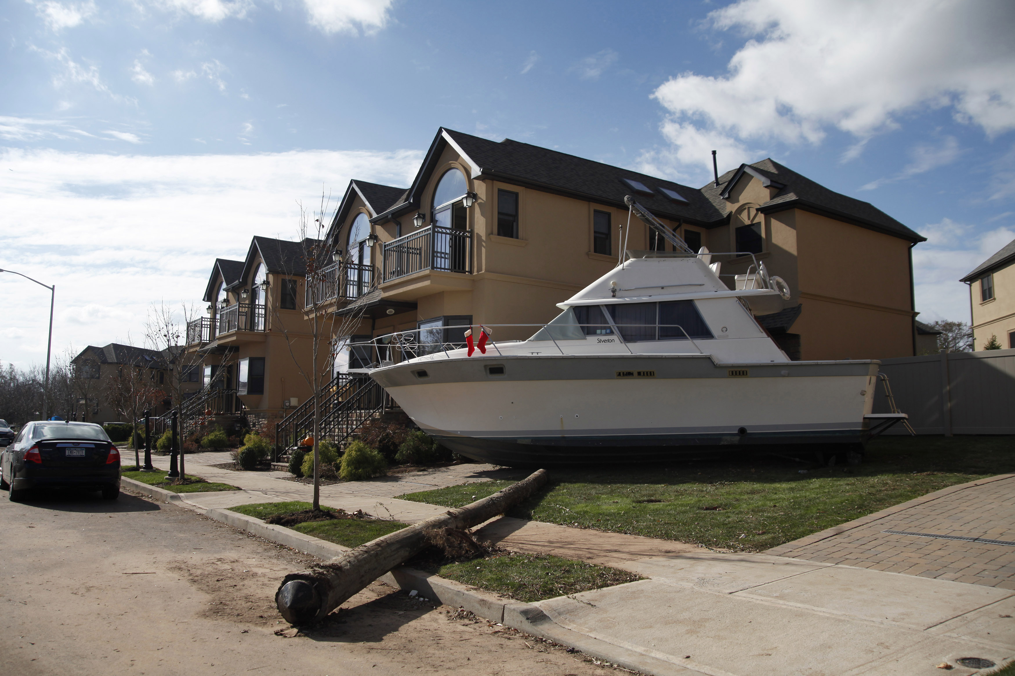 A boat sits in a storm-damaged yard in Staten Island.