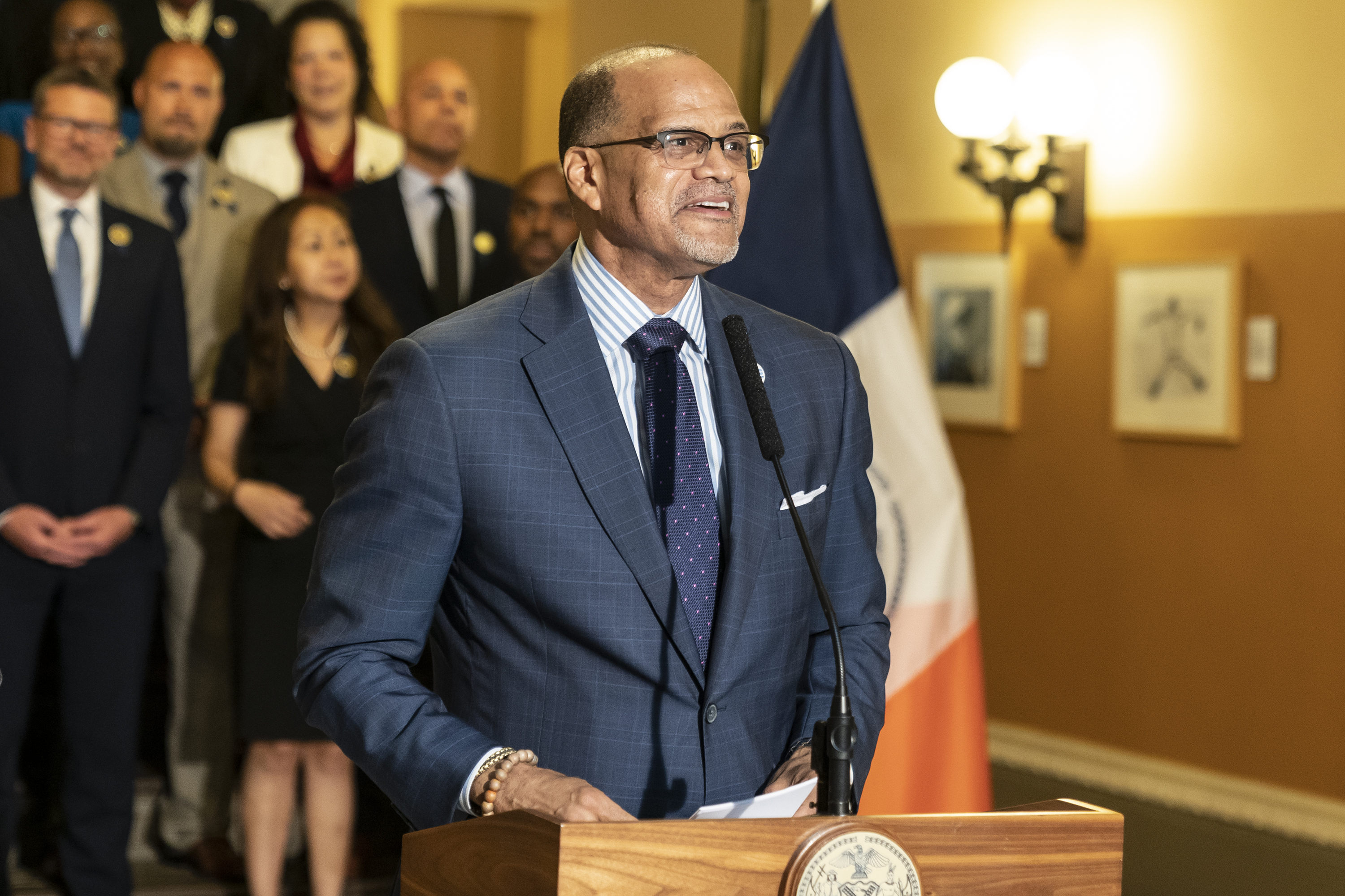 Chancellor David Banks speaks at a podium.