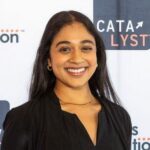 Trisha Prabhu, founder and CEO of ReThink, accepts the 2023 Catalyst Top Grant Award at a Nov. 9 event in Washington, D.C., to celebrate the CTIA Wireless Foundation Catalyst winners.