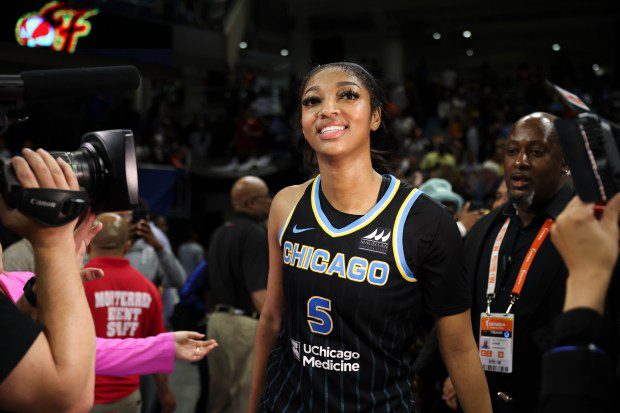 Chicago Sky forward Angel Reese (5) is interviewed by Holly Rowe after defeating the Indiana Fever 88-87 at Wintrust Arena on June 23, 2024. (Eileen T. Meslar/Chicago Tribune)