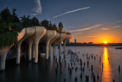 Sunset over Little Island on the Hudson River near Pier 57 in Manhattan