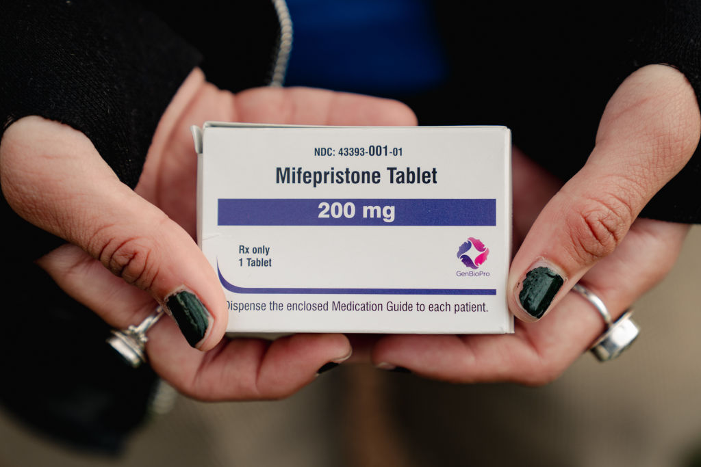 A box of mifepristone pictured outside the U.S. Supreme Court in Washington, D.C., on March 26, 2024.