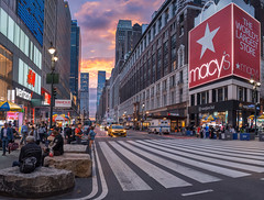 View of the sunset over 34th Street and Sixth Avenue in Manhattan.