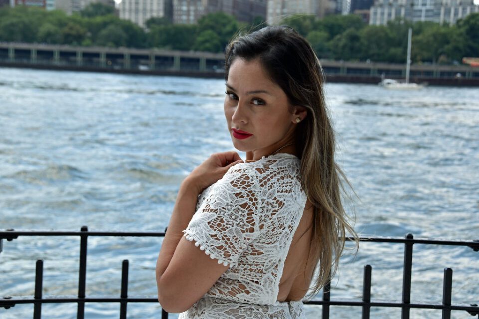 Picture Of Carolina Wearing A White Laced Romper Dress Taken During A Summer Photoshoot In Astoria Queens In New York City. Photo Taken June 2022