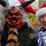 Israeli (Krampus) Santa (L) & Palestinian Santa (R)  at SANTACON NYC 2024  DSC01497