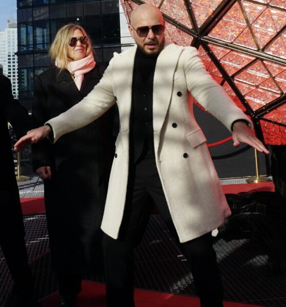 Pitbull next to the Times Square New Year's Eve ball this morning